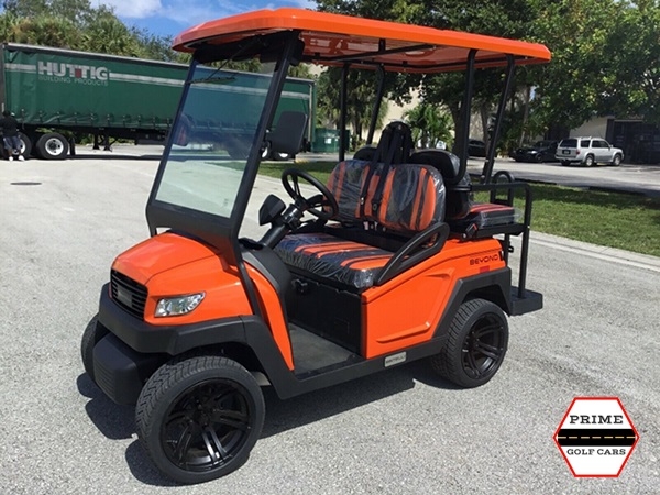 Orange Bintelli Beyond 4 Passenger Golf Cart affordable golf cart rental, golf cart rent lehigh acres