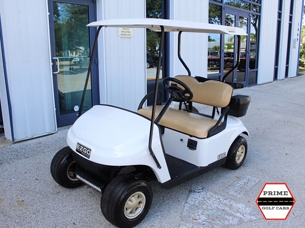 White EZGO 2 Passenger Golf Cart affordable golf cart rental, golf cart rent lehigh acres
