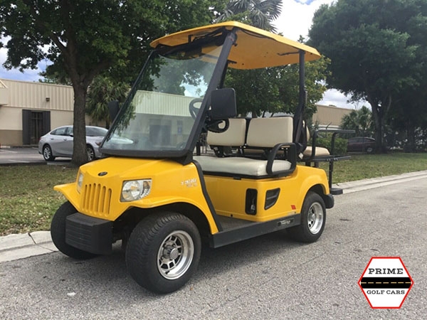 Yellow Tomberlin 4 Passenger Golf Cart lehigh acres golf cart rental, golf cart rentals